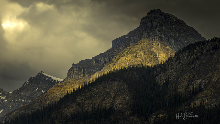 Sunset Casting A Glow on Mountain Peak In Lake Louise Alberta Canada  Print