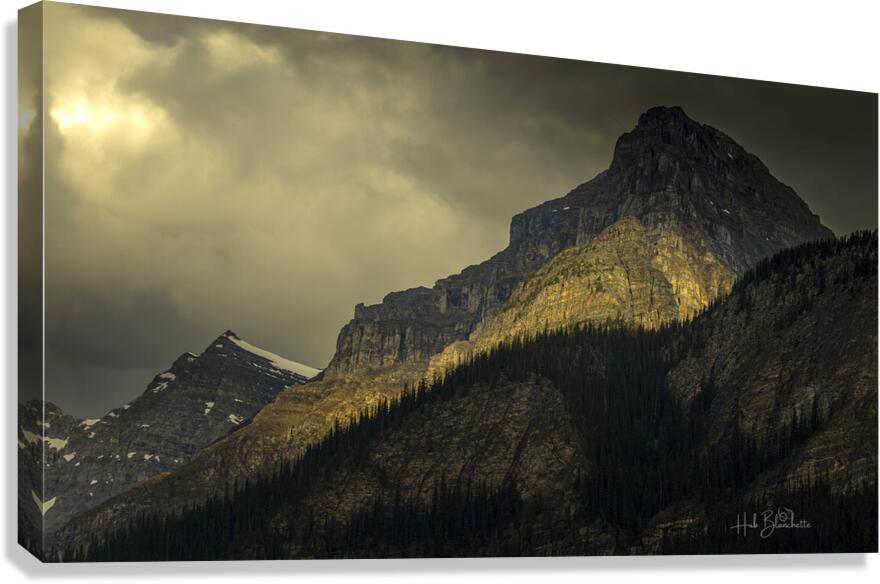 Sunset Casting A Glow on Mountain Peak In Lake Louise Alberta Canada Canvas Print